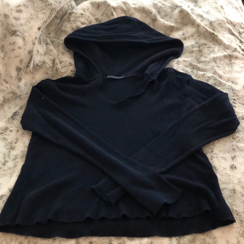 A navy long sleeve Brandy Melville sweater